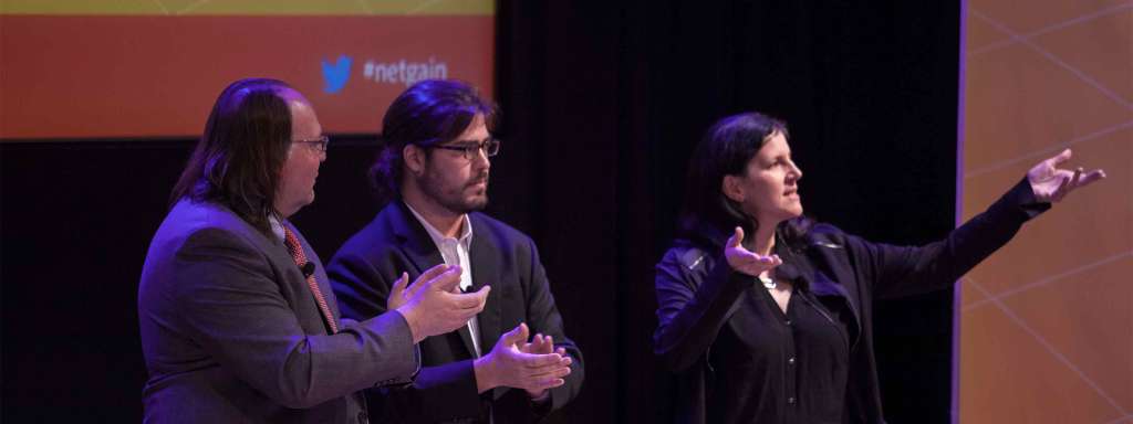 Ethan Zuckerman, Christopher Soghoian, and Laura Poitras speak onstage.