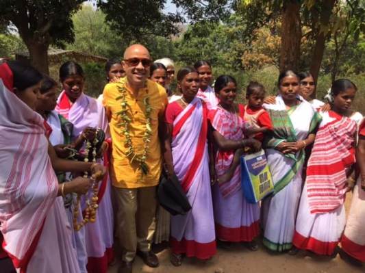 Darren Walker with local women in the village of Teliya. “We don't know the strength we have in ourselves,” one of them told me. But they are finding it every day. This image is not available under the 4.0 Creative Commons license.