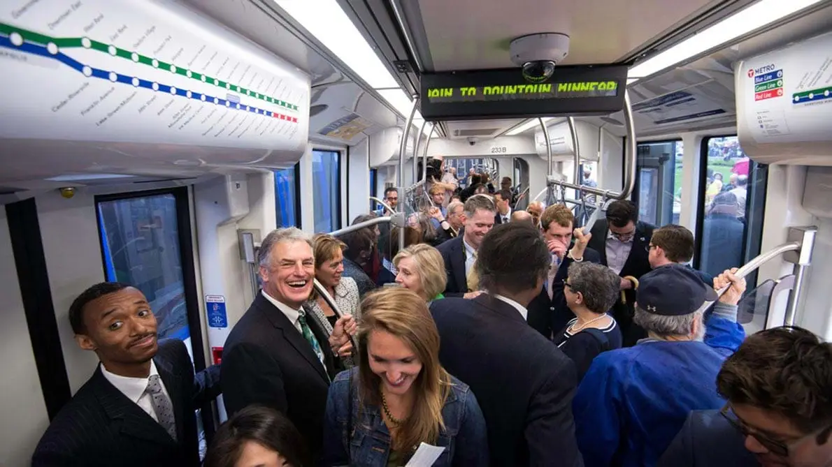  Commuters on the green line. This image is not available under the 4.0 Creative Commons license.