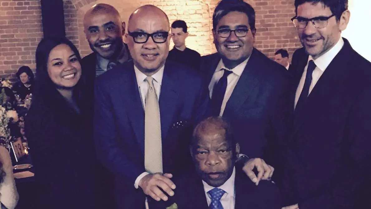 Ford Foundation staff with Congressman John Lewis (seated). This image is not available under the 4.0 Creative Commons license.