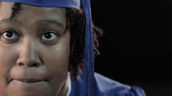High School Student in Cap and Gown