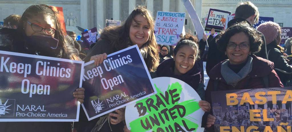 People demonstrating outside the Supreme Court