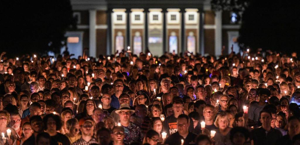 People march with lit candles across the University of Virginia (Photo by Salwan Georges/The Washington Post via Getty Images)
