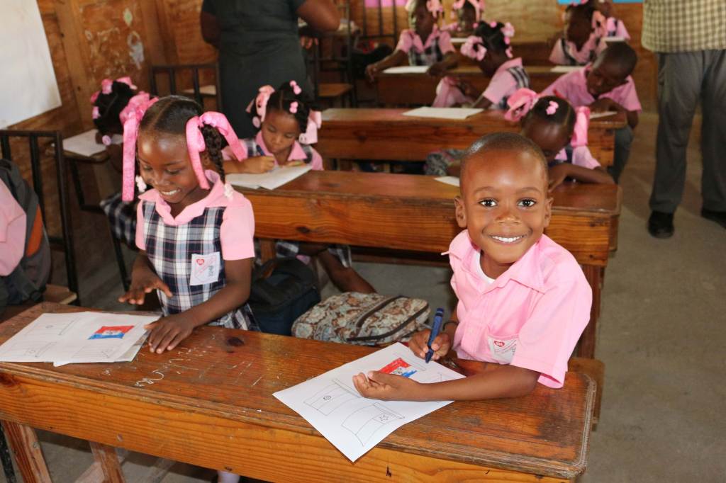 Young African students in a classroom.