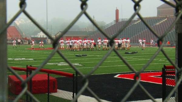 Players on football field