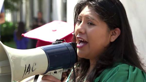 Young woman with megaphone
