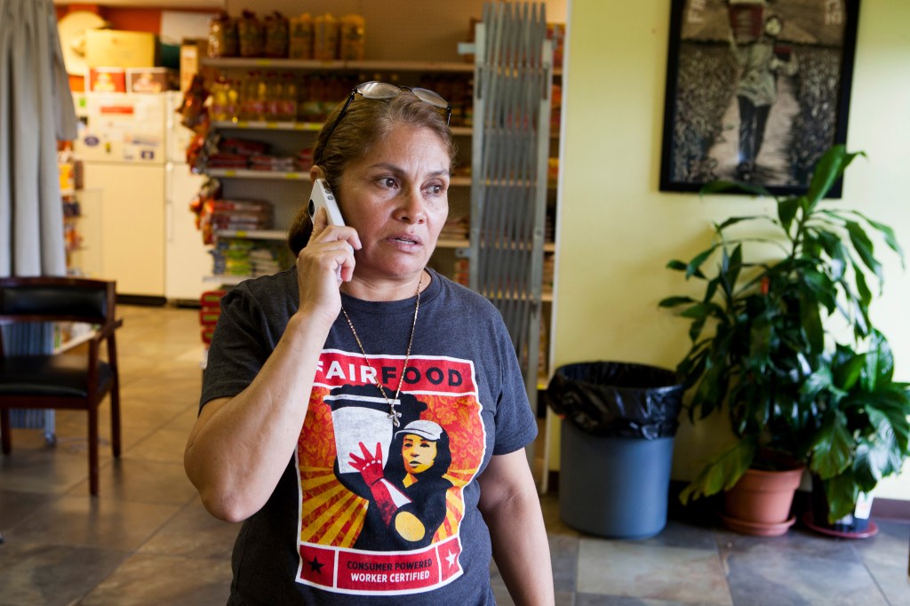Nery Rodriguez works at The Coalition of Immokalee Workers headquarters, a nonprofit that fights for worker rights. (Photo by Melanie Stetson Freeman/The Christian Science Monitor via Getty Images)