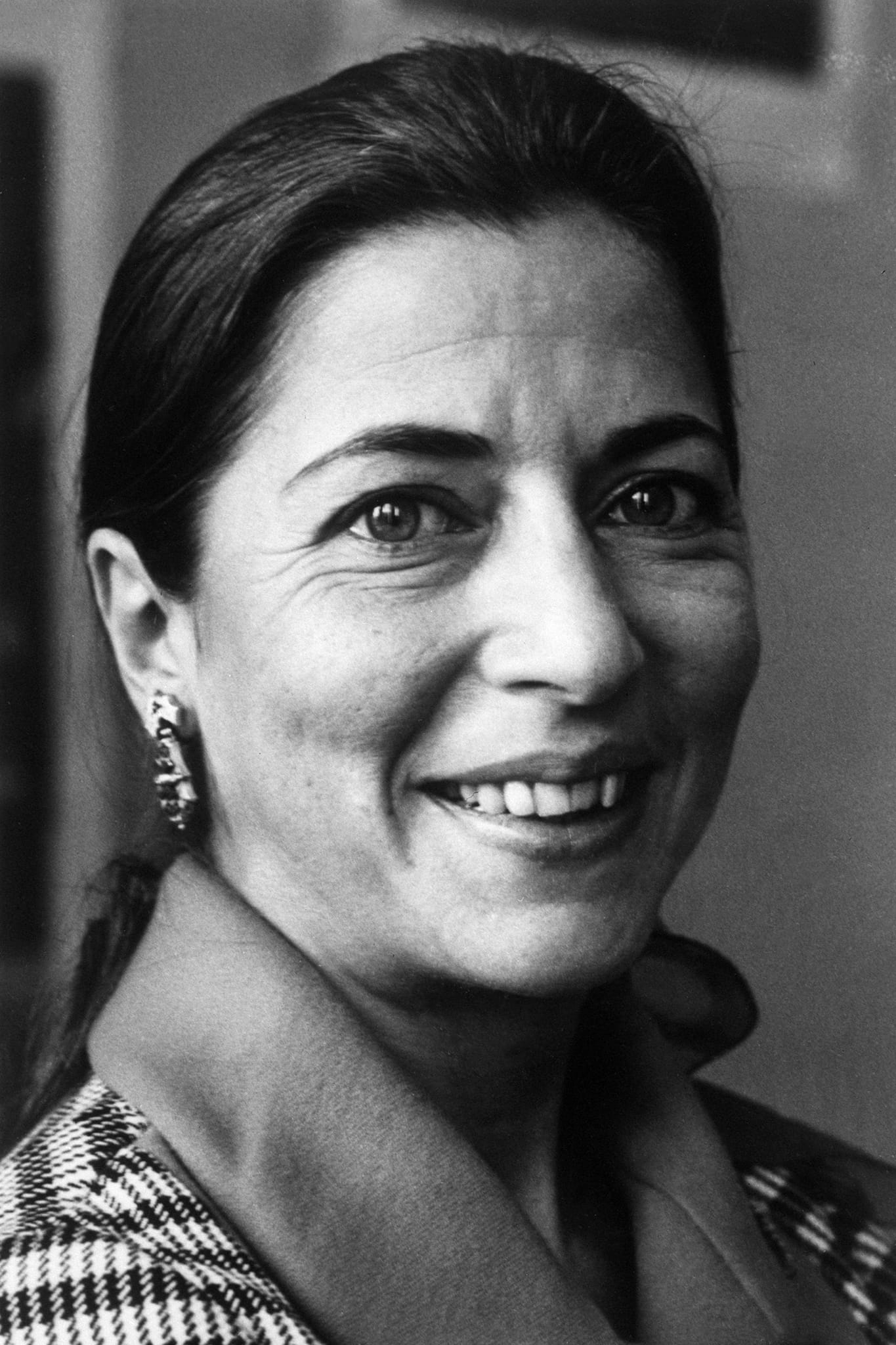 A black and white portrait of Ruth Bader Ginsburg in the 1970's.