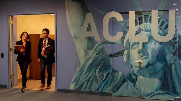 Two lawyers exiting the ACLU building