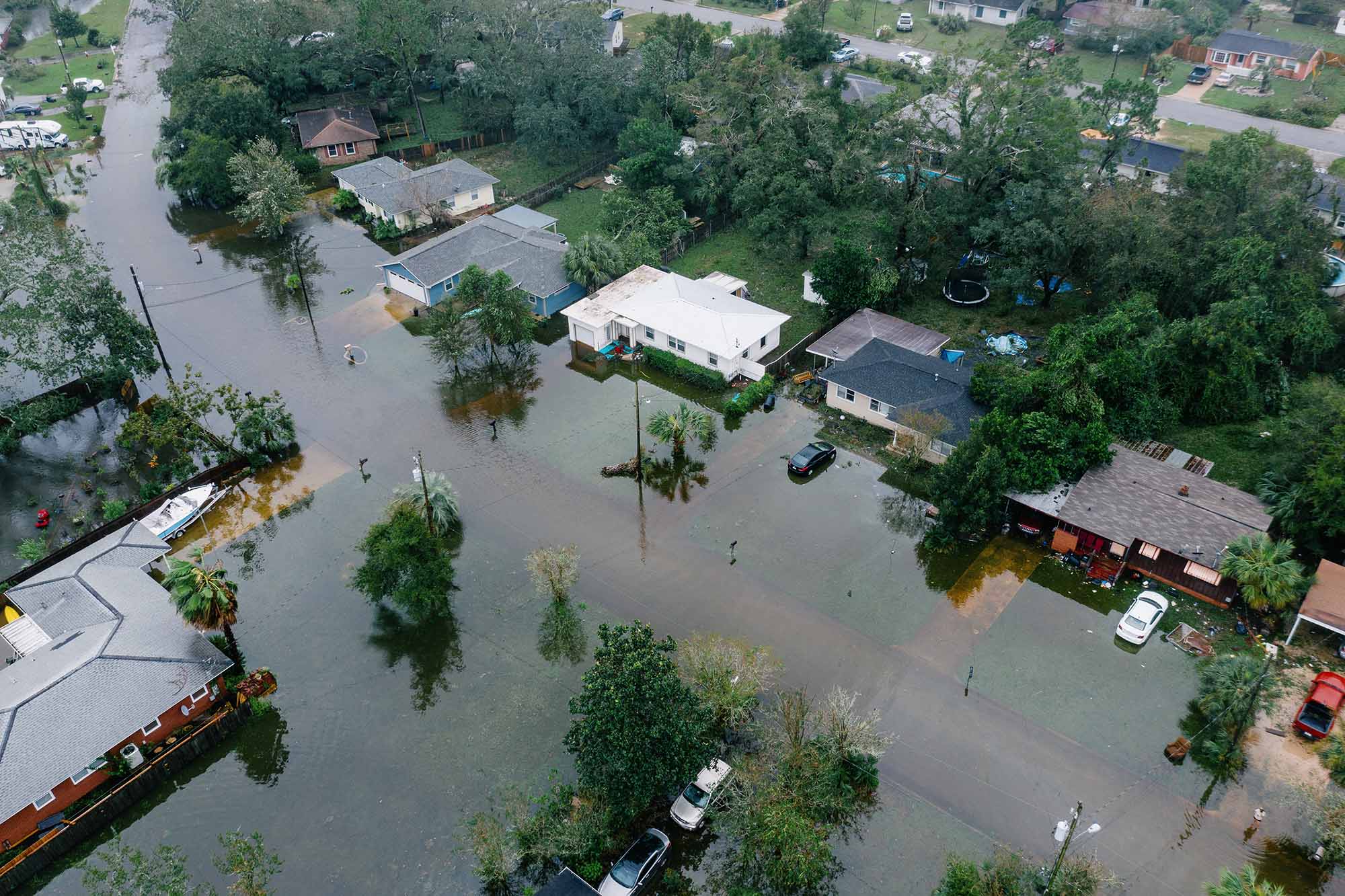  An aerial view of a town in Louisiana flooded after a hurricane.