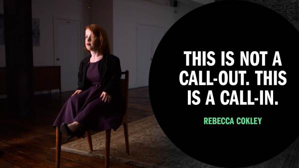 Rebecca Cokley has shoulder-length reddish hair, is wearing a black blazer over a burgundy dress, and is sitting on a chair. Next to her is copy in a black circle that reads, "This is not a call-out. This is a call-in."