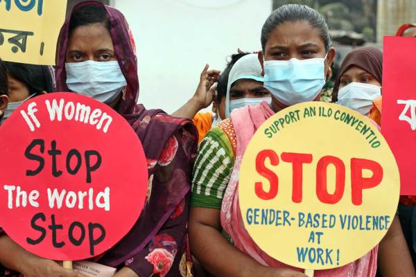 Garments factory workers take part during a protest, in front of the National Press Club.