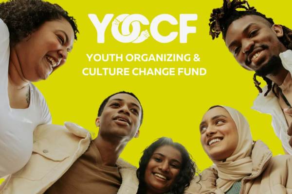A group shot of young people against a yellow background with the YOCCF logo.