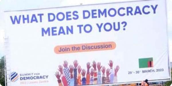 Billboard with the tex"What does democracy mean to you?