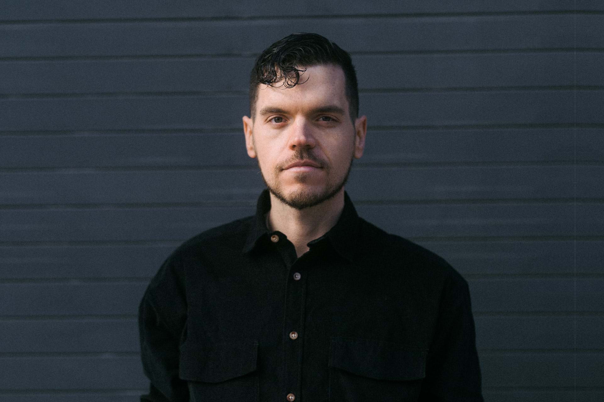 Portrait of Dom Kelly