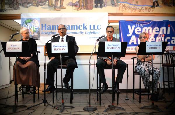 A photograph of four mayoral candidates for Hamtramck debating each other