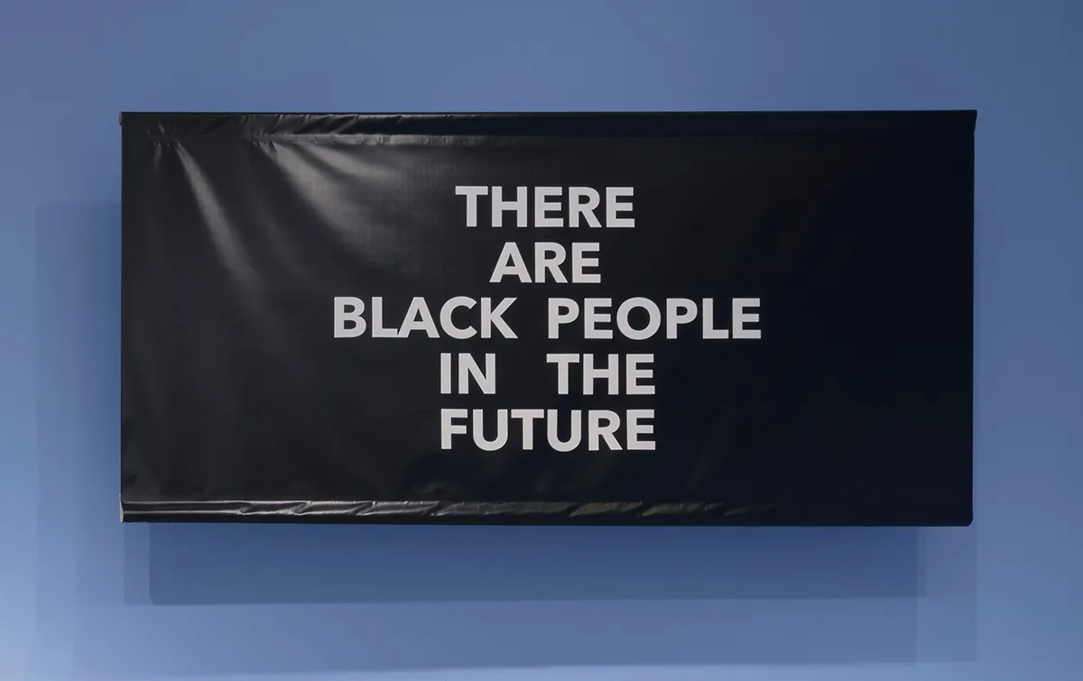 White text on a black background that reads, “THERE ARE BLACK PEOPLE IN THE FUTURE”