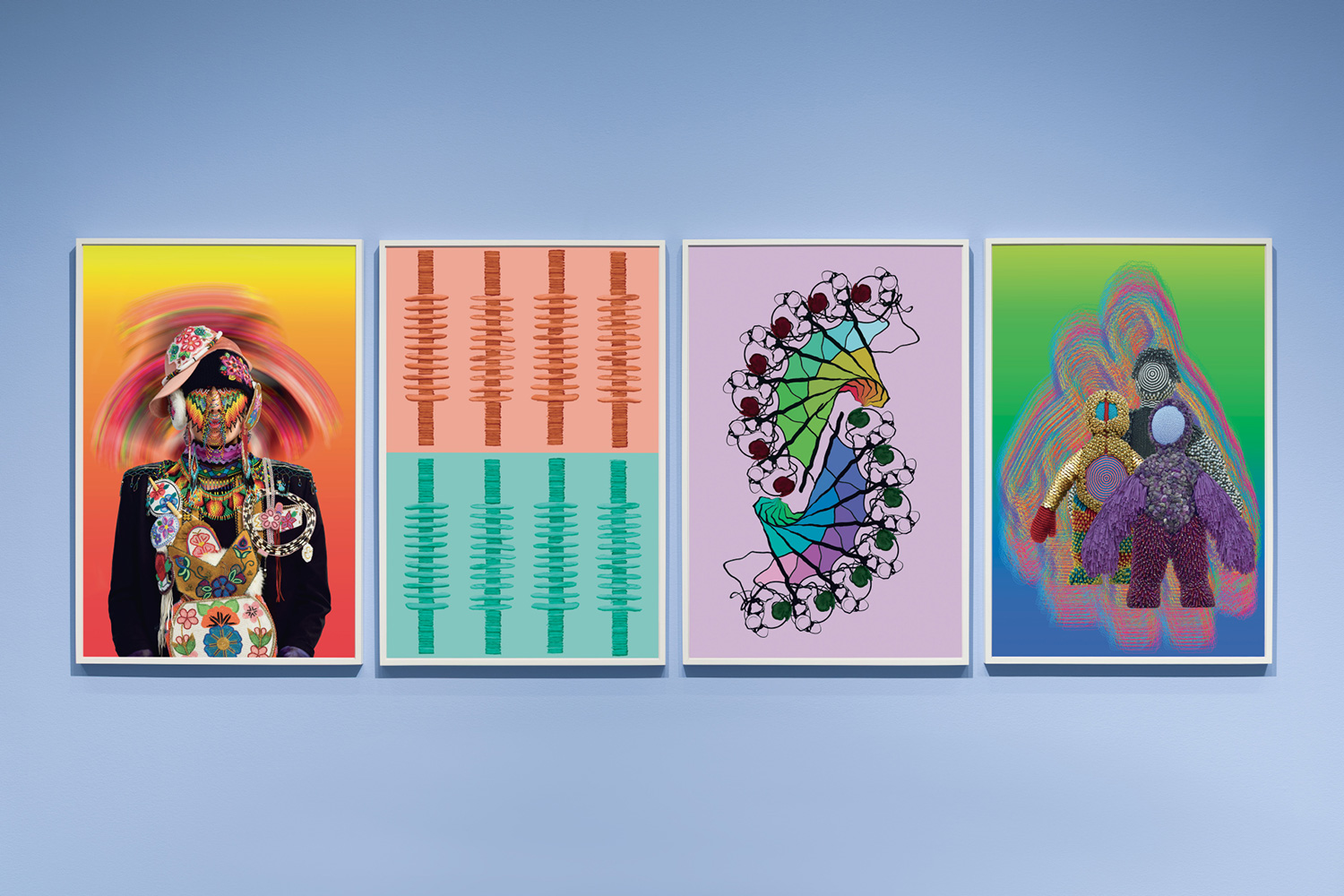 Four framed posters in a row with vibrant colors.