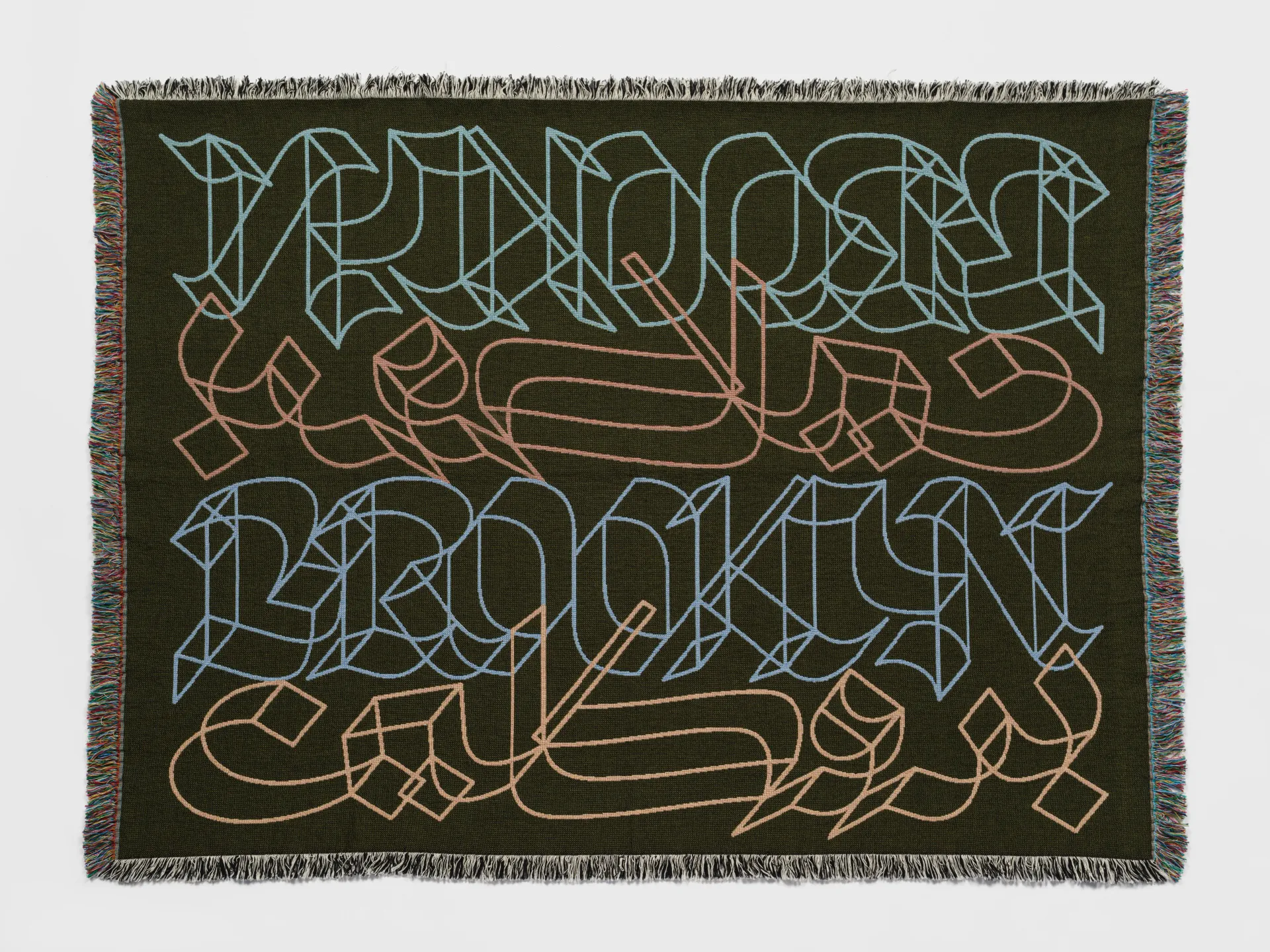 Woven tapestry with the word “Brooklyn” in English and Arabic.