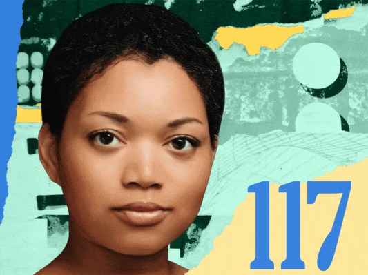 A woman stands against a blue, green, and yellow textured background, with the number 117 prominently displayed nearby.