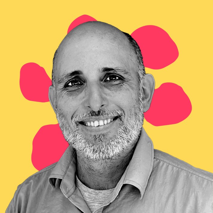 B&W Picture of Luis Javier Velasquea Varela against a yellow and red graphic background.
