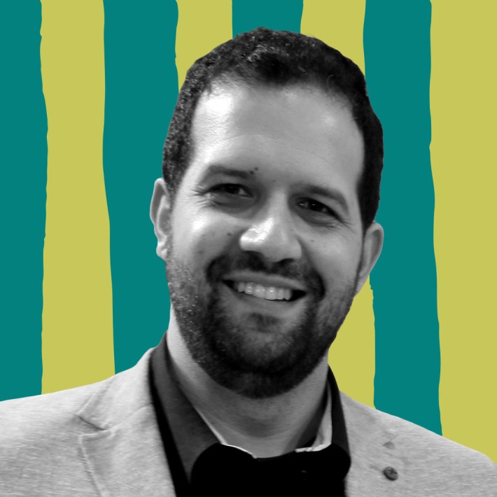 B&W Picture of Samer Sfeir against a light and dark green graphic background.