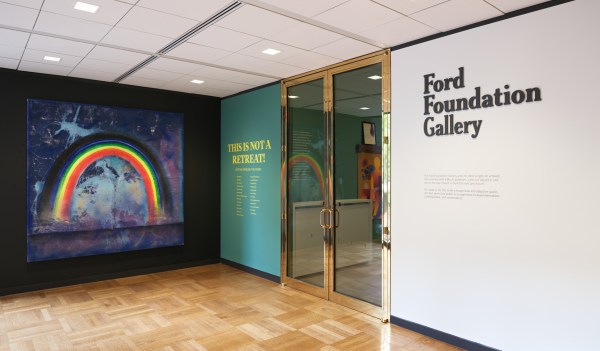 A painted rainbow artwork next to the entrance of the Ford Foundation Gallery.