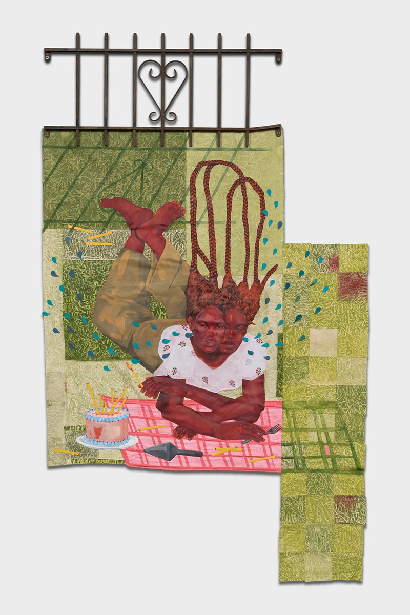 A painted textile collage of a two-headed Black girl with intertwining braids lying in grass, having a birthday picnic and crying.