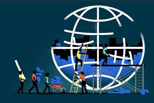 An illustration shows a team of people building a large, white outline of a globe with blue blocks. Some are on ladders or scaffolding, while others push a wheelbarrow, symbolizing collaborative construction and global cooperation.