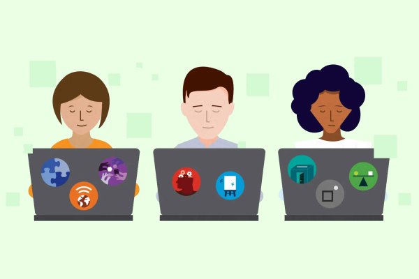 Individuals working on laptops against a mint background