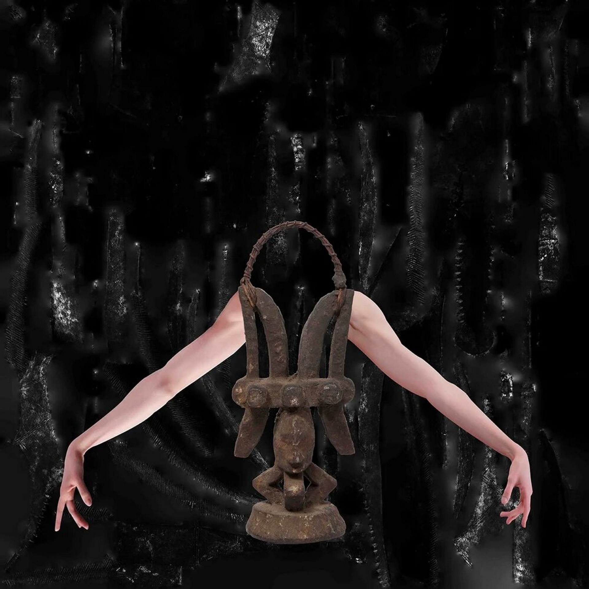 An abstract collage of a rusted metal sculpture with a handle, in which two white arms protrude angled downwards, tensely posed and pointed in a dancerly form.